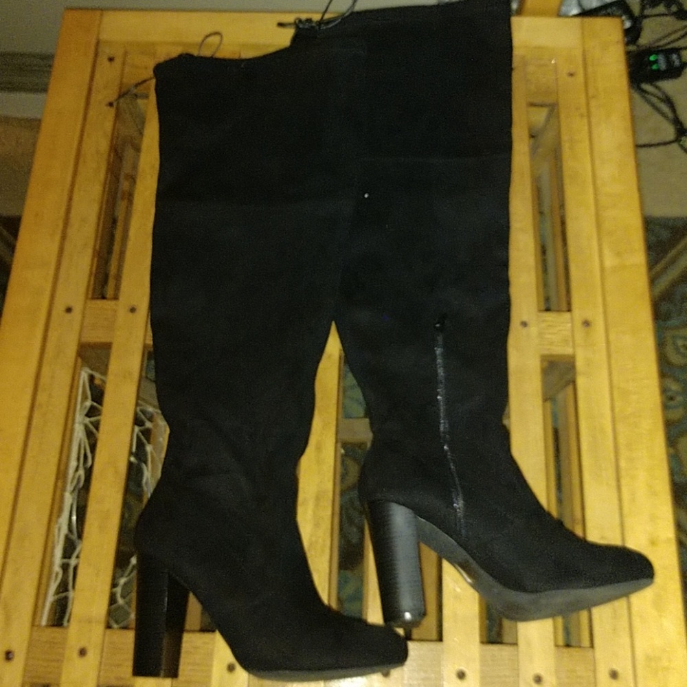 Thigh high heeled boots